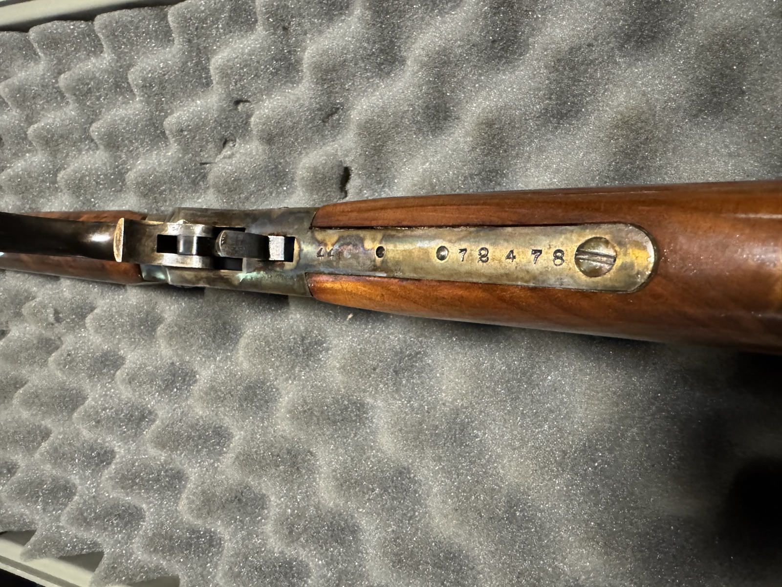 Lower tang of the Stevens 44 stamped 44 and serial number 72478, with case color on the tang